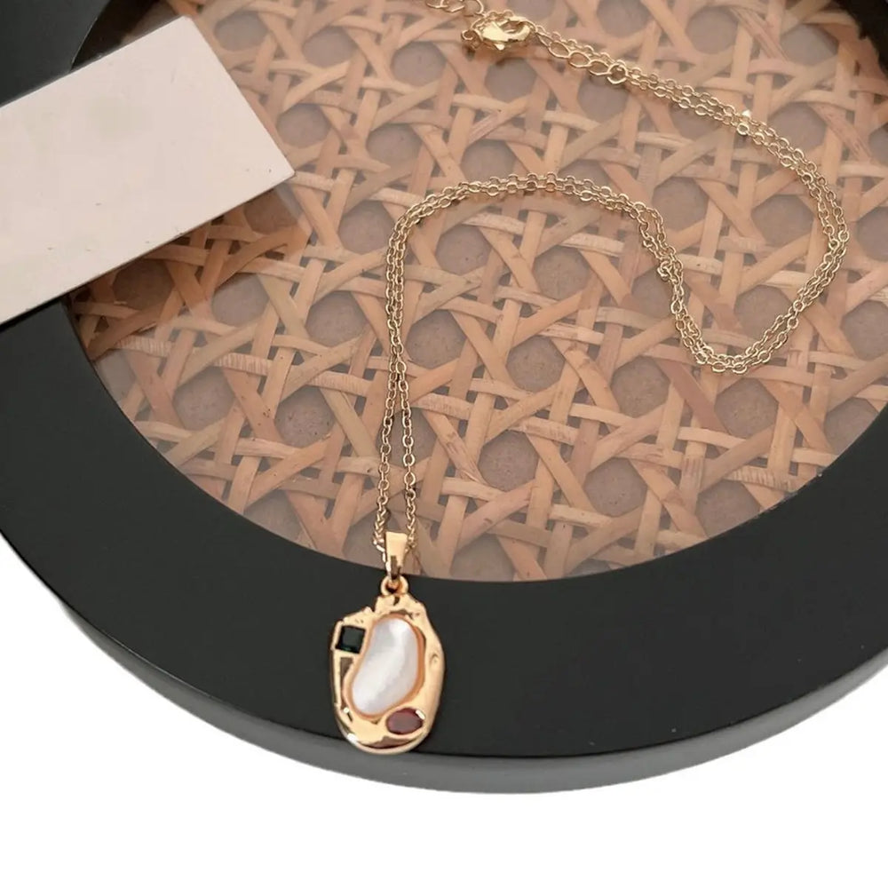 Irregular Geometric Shell Pendant