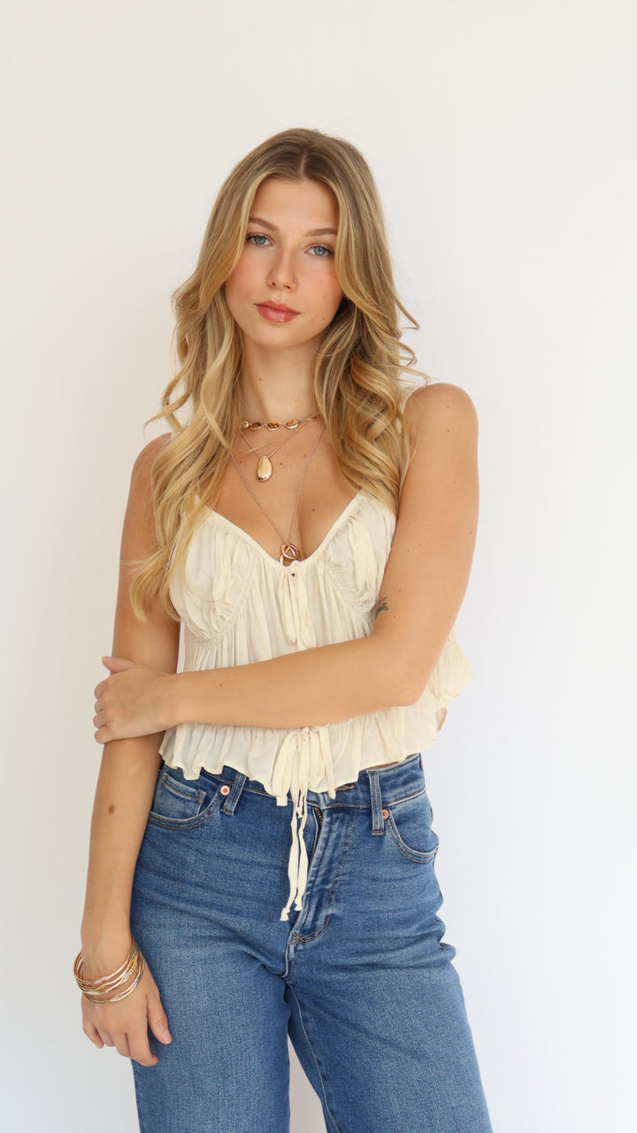 Flirty Tie Front Ruffle Hem Top
