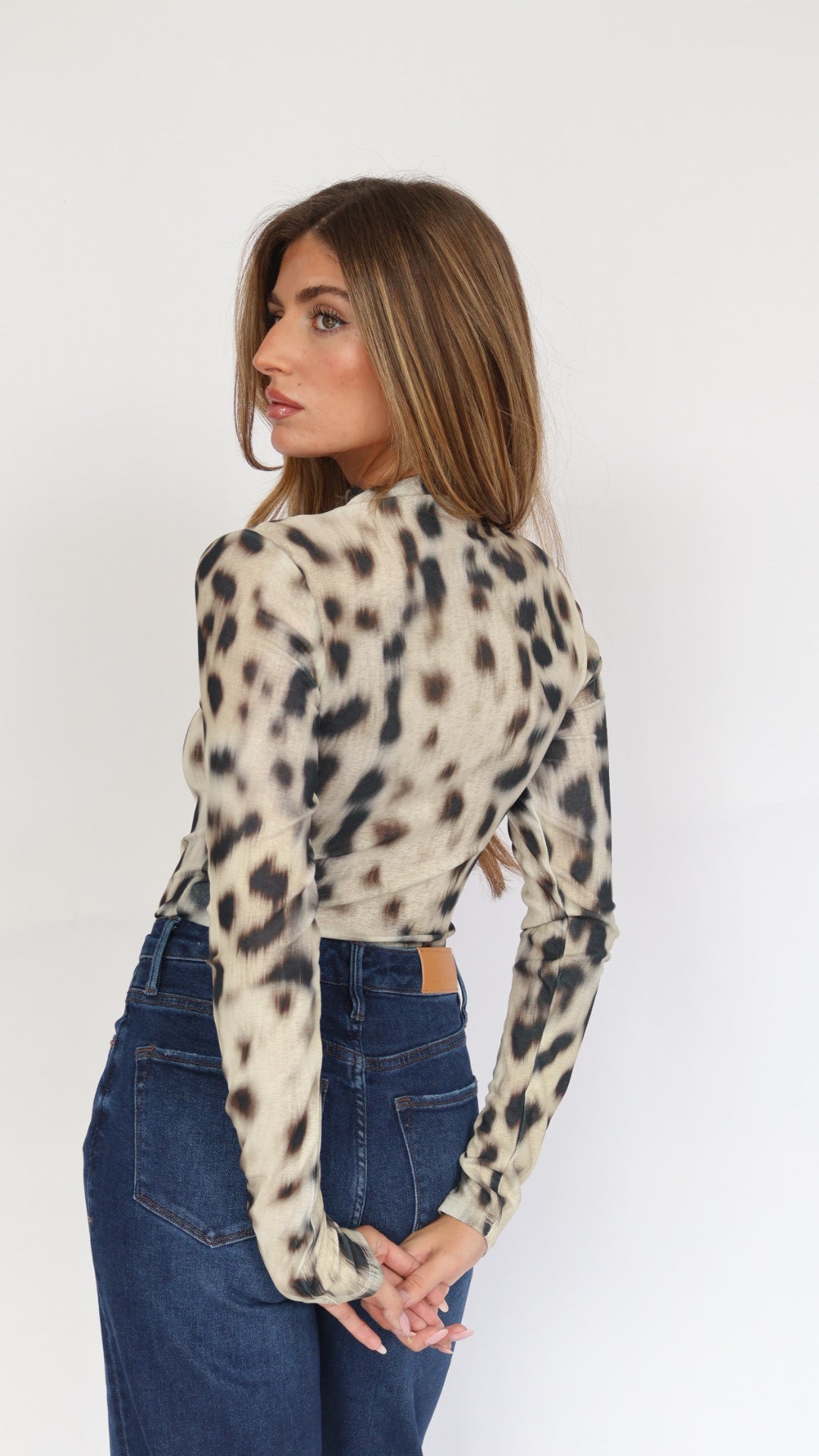 Habitual Animal Print Turtleneck Top