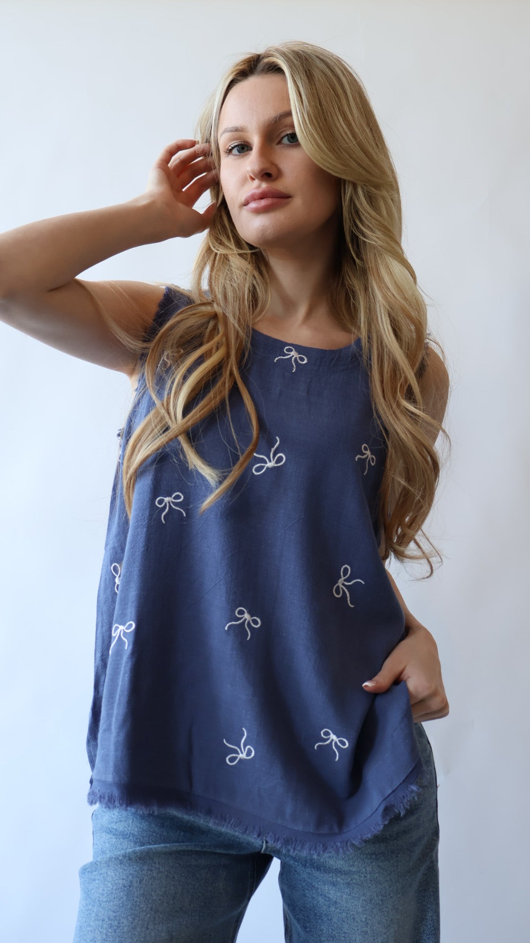 Embroidered Bow Sleeveless Top